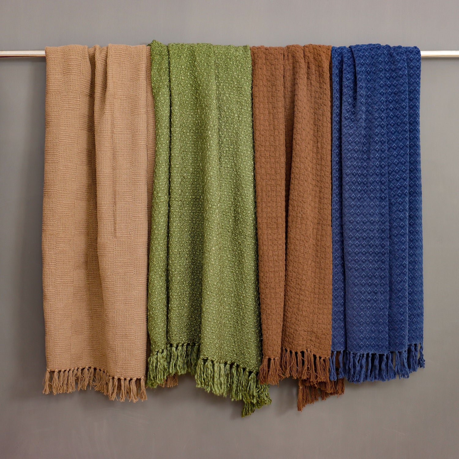 Add a touch of comfort and style to your home with this lightweight cotton throw. Perfect for layering, relaxing, or decorating any space. Shop now!